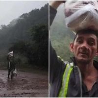 Menino gaúcho viraliza ao dizer que tem “orgulho do pai” que carrega cesta básica debaixo de chuva  