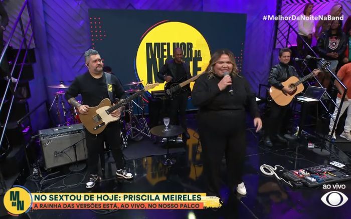 . Folha de São Paulo, TV Globo e TV Record também já repercutiram o trabalho dela, mas a cantora ainda não havia estado em rede nacional ao vivo como nesta sexta. / reprodução Band