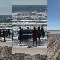 Caminhonete vai parar no mar da praia do Mariscal