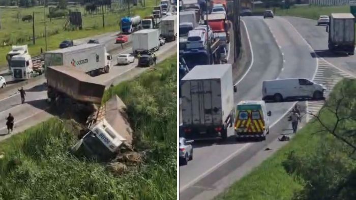 Equipes trabalham para liberar a rodovia (Foto: Reprodução)