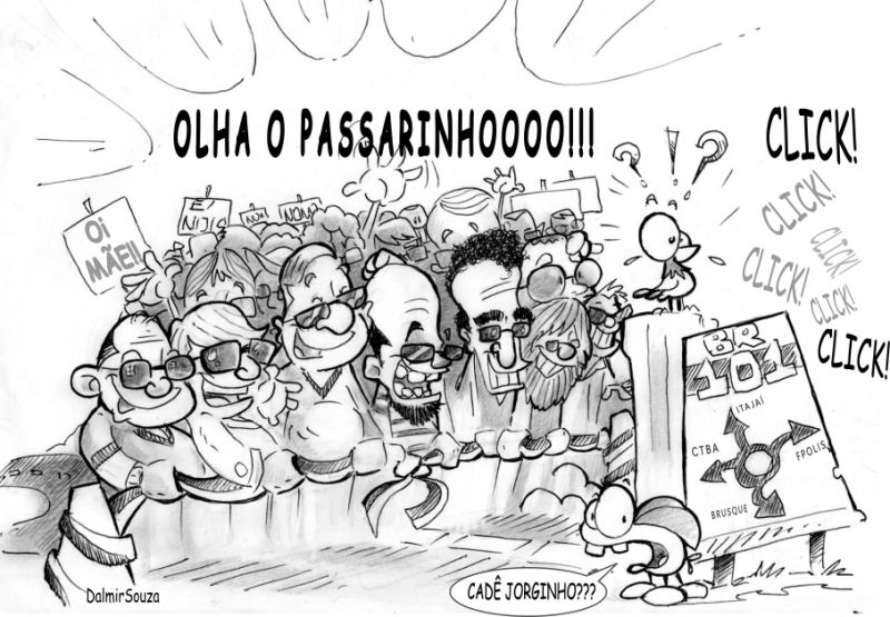 Enquanto isso, na inauguração do trevo da Antônio Heil com a BR 101. (Charge Dalmir Souza)